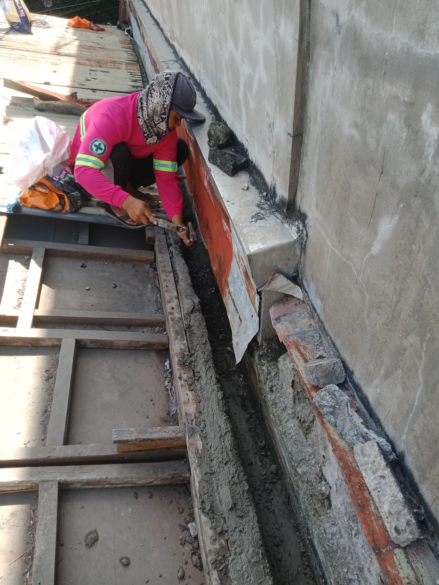 Wooden room divider construction and door repair